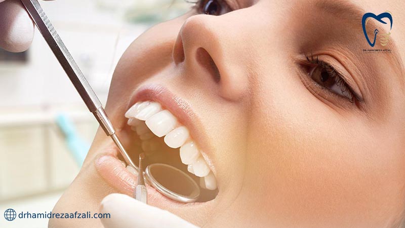 معاینه دندان توسط دندانپزشک